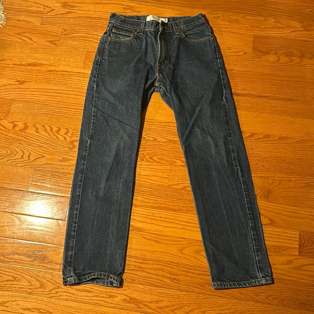 Medium-dark wash Levi’s 505 regular fit jeans